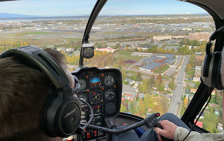 Aerial view of Anchorage Alaska from helicopter cockpit.