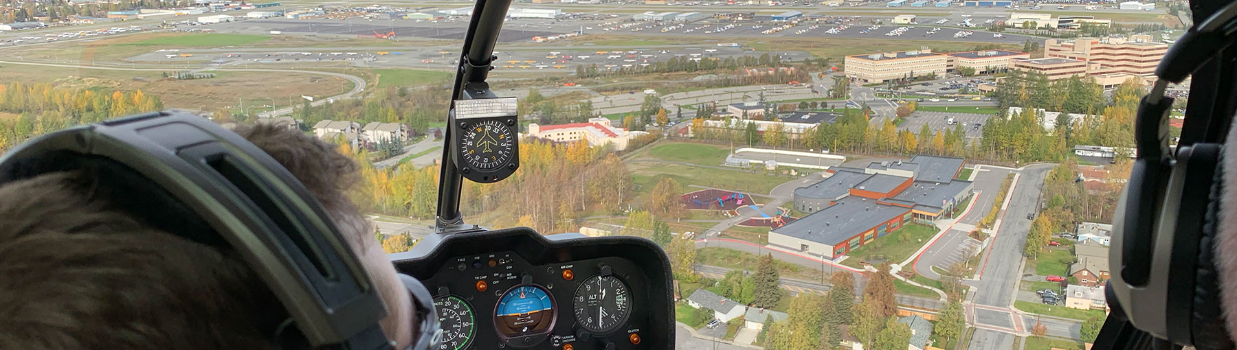 Aerial view of Anchorage Alaska from helicopter cockpit.