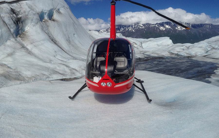 Helicopter landed on an iceberg.